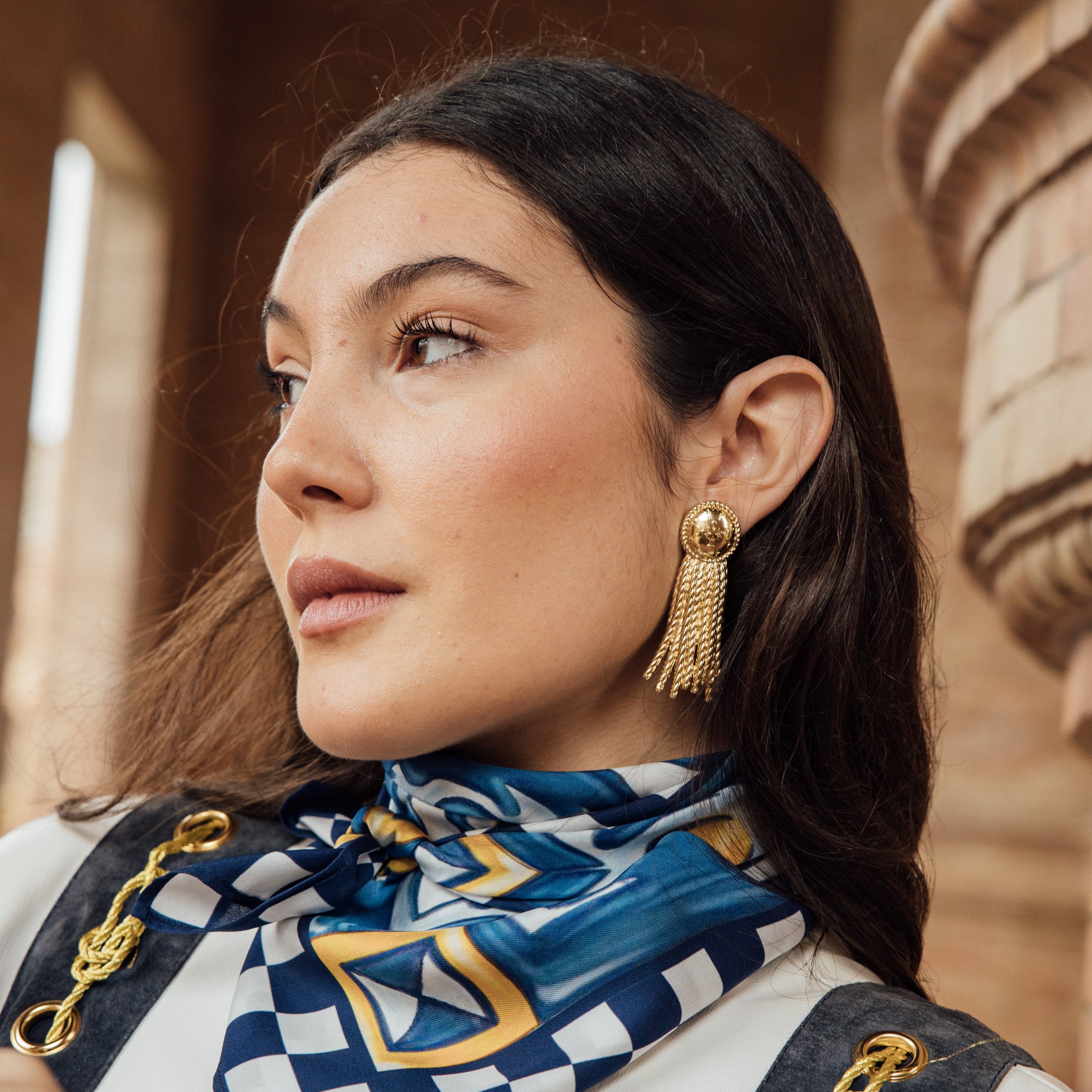 Bullfighter costume earrings, gold